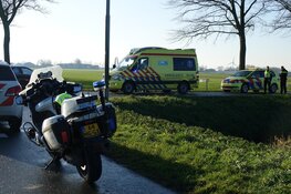 Auto te water bij botsing